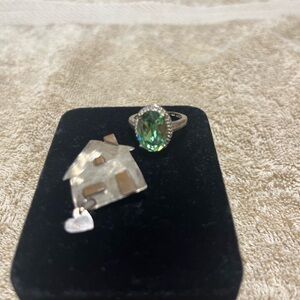 Silver house pin and ring.